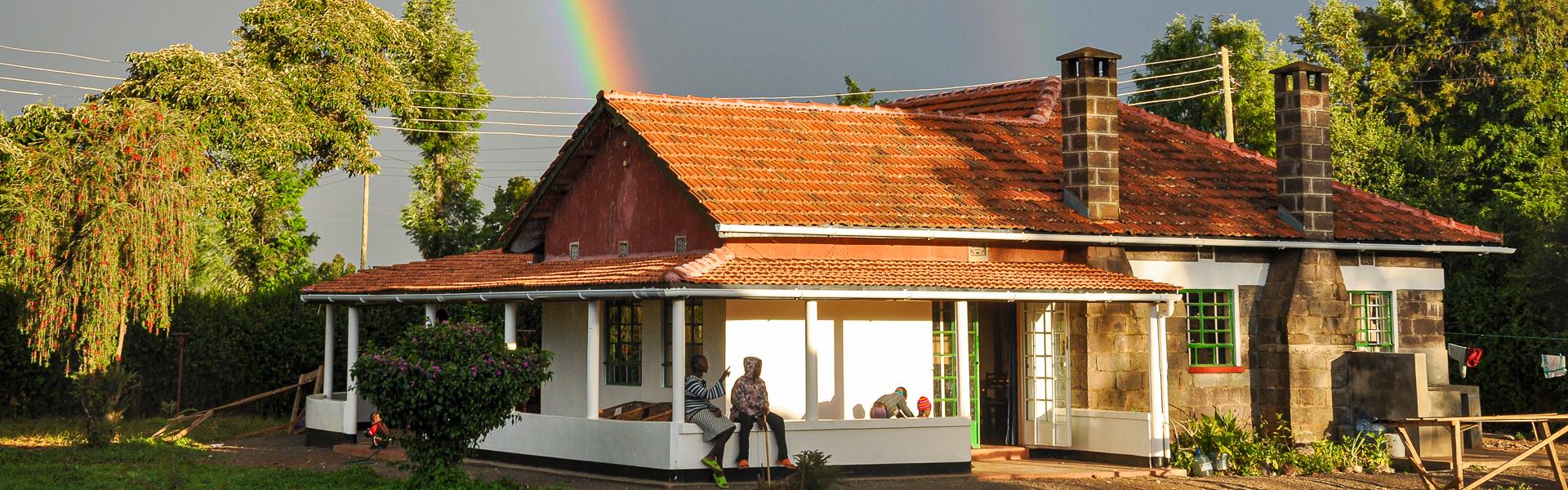 Malaika Haus mit Regenbogen |  Malaika / Chamleon