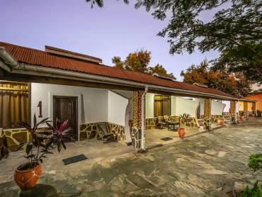 Tan-Swiss Lodge |  Exit Hamster, Tan-Swiss Lodge / Chamleon